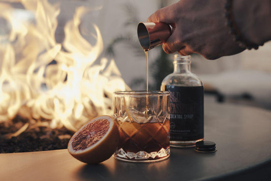 Making an Old fashioned cocktail using mix in glass bottle