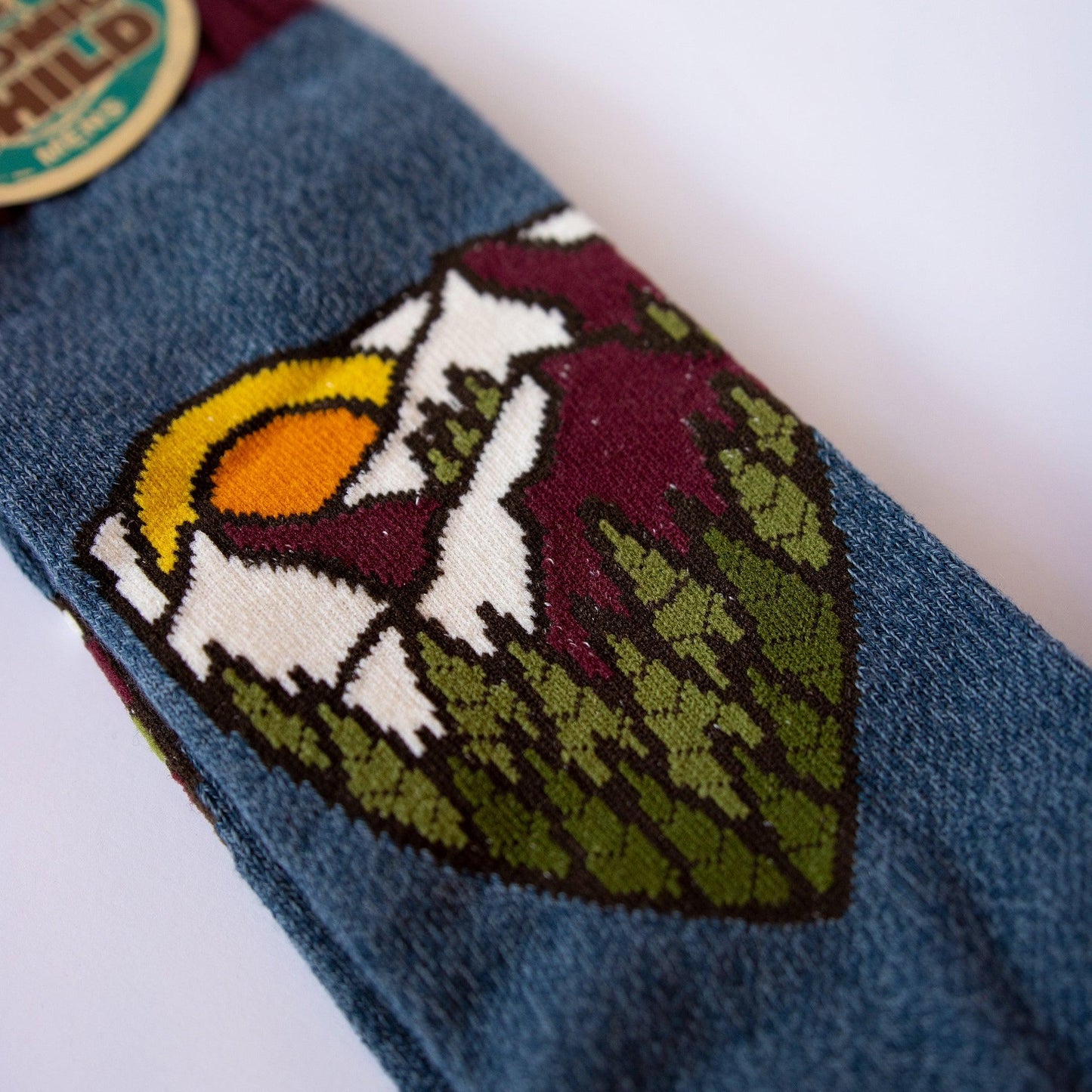 Mountain boot socks with trees and sun details