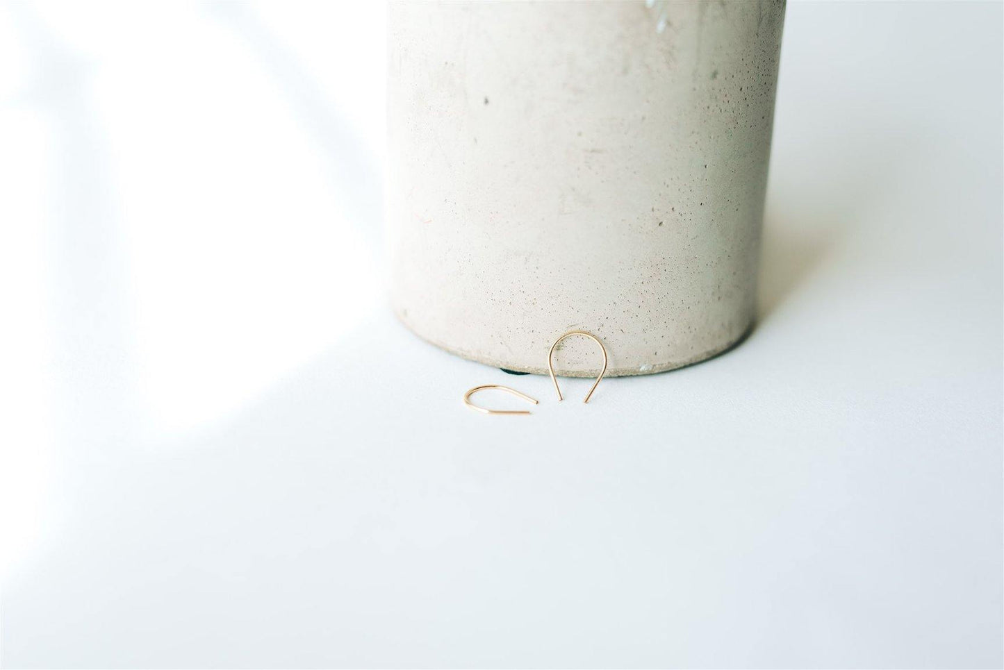 tiny simple arch shaped earrings