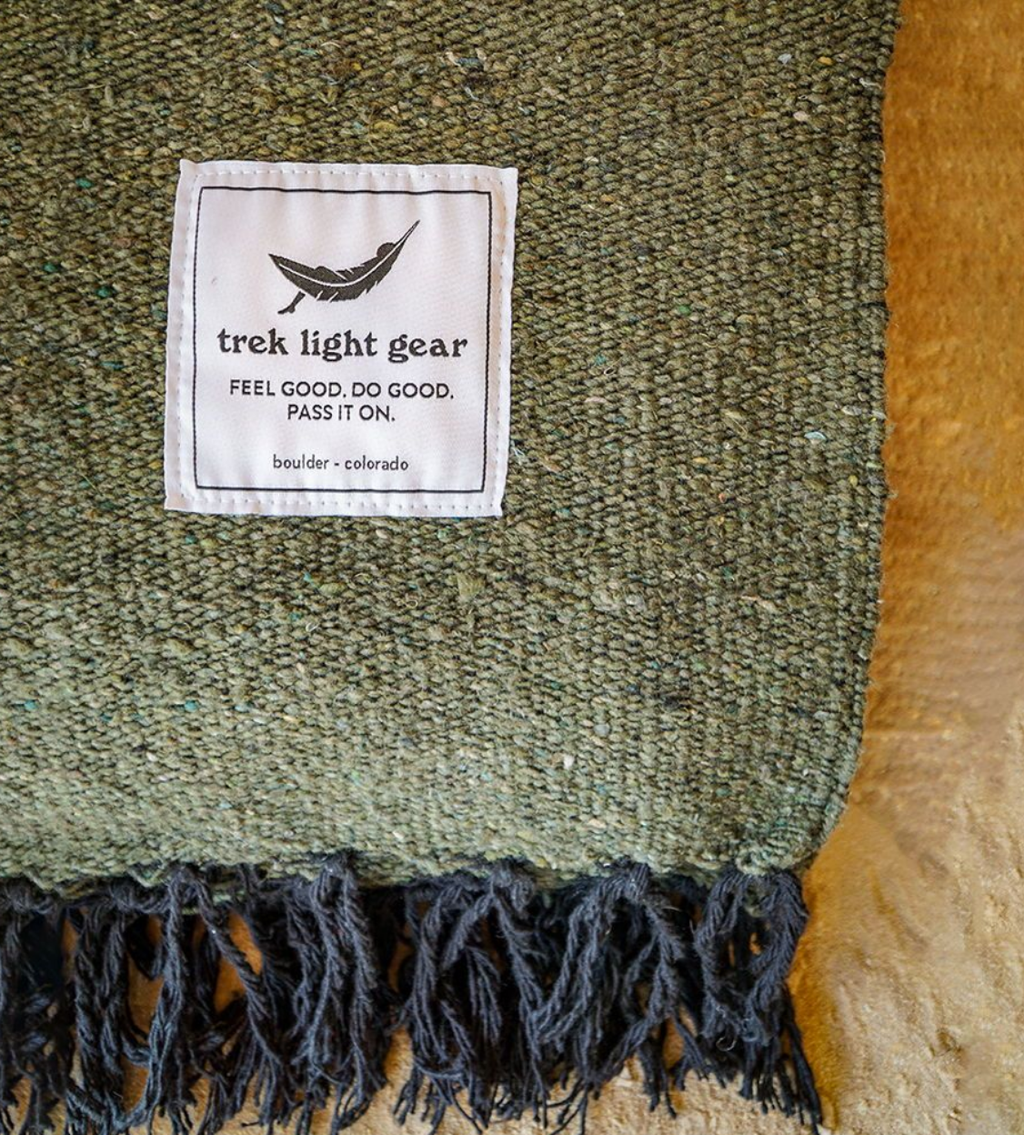 Solid green evergreen blanket. Sustainable hand-woven in Mexico.
