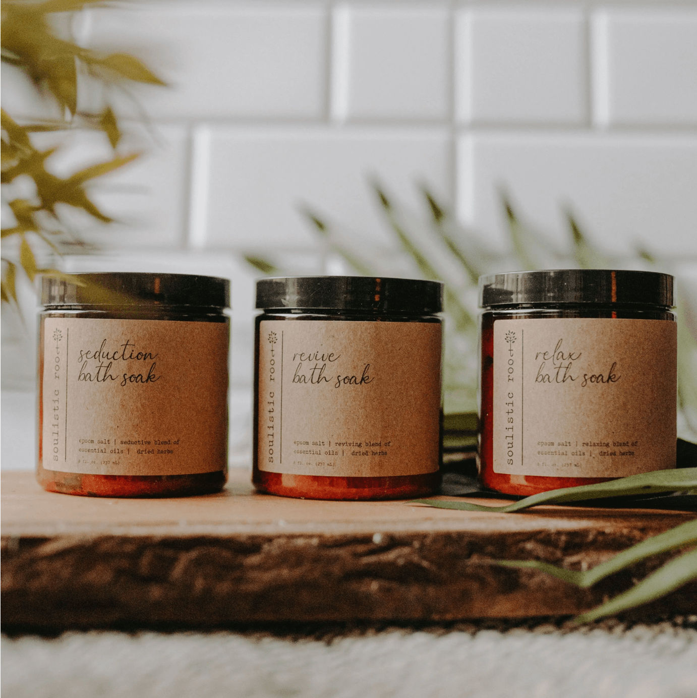 assorted bath soaks in amber jars