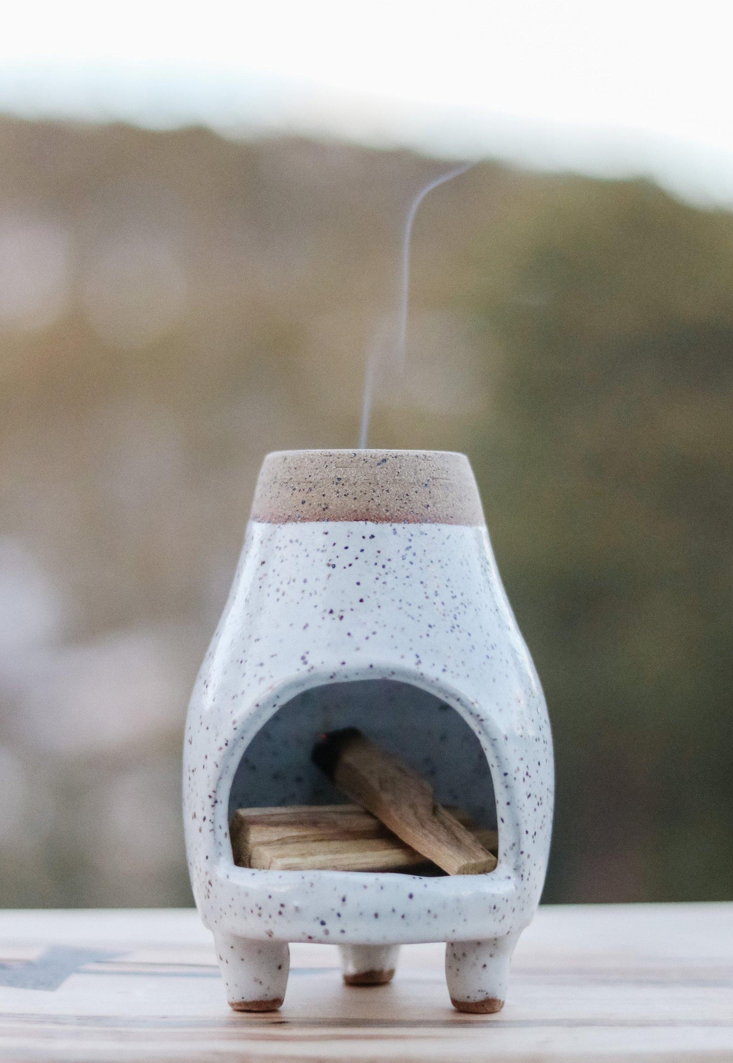 White speckled ceramic chiminea. Perfect for incense, palo santo or a tea light candle.