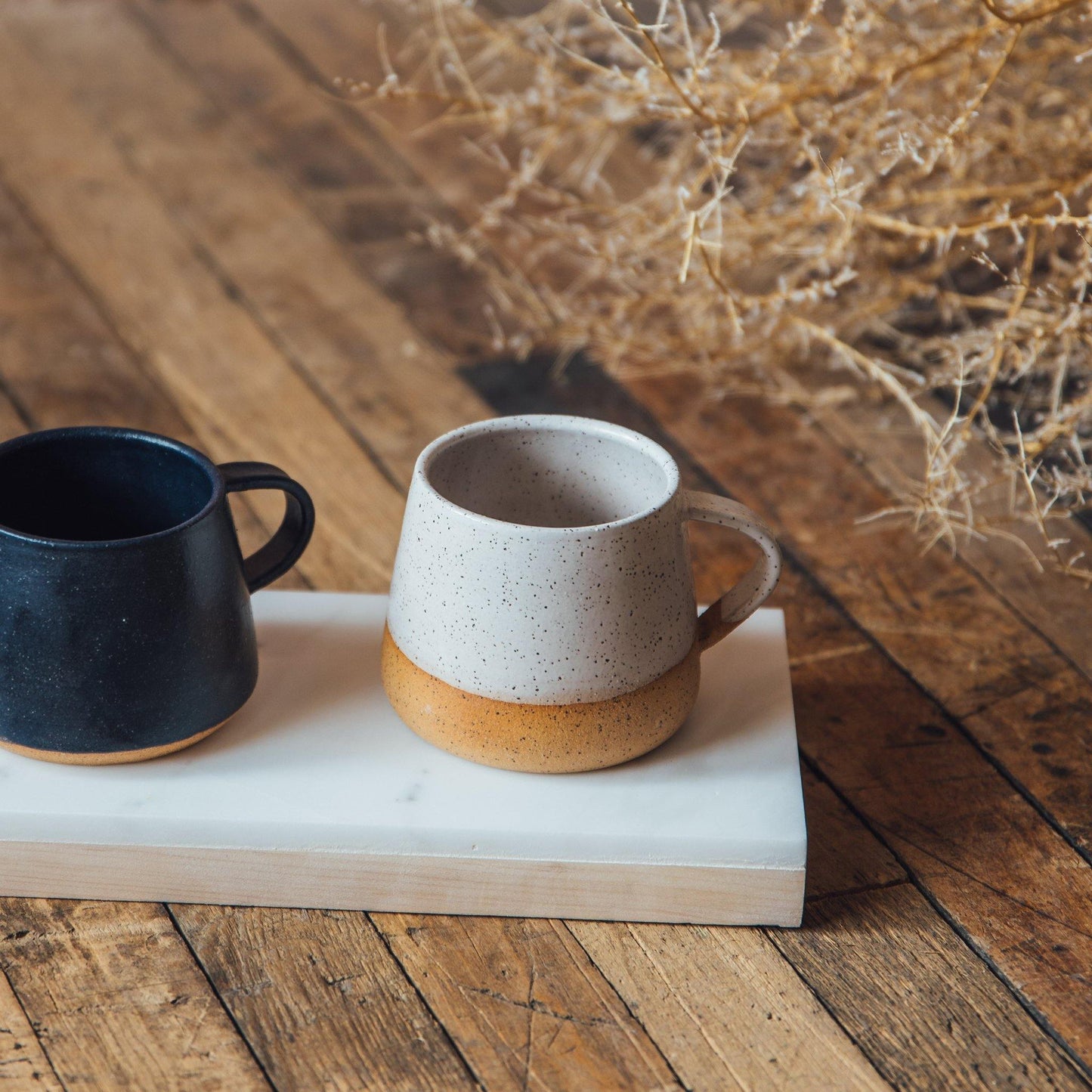 white speckled handmade wheel thrown coffee mug