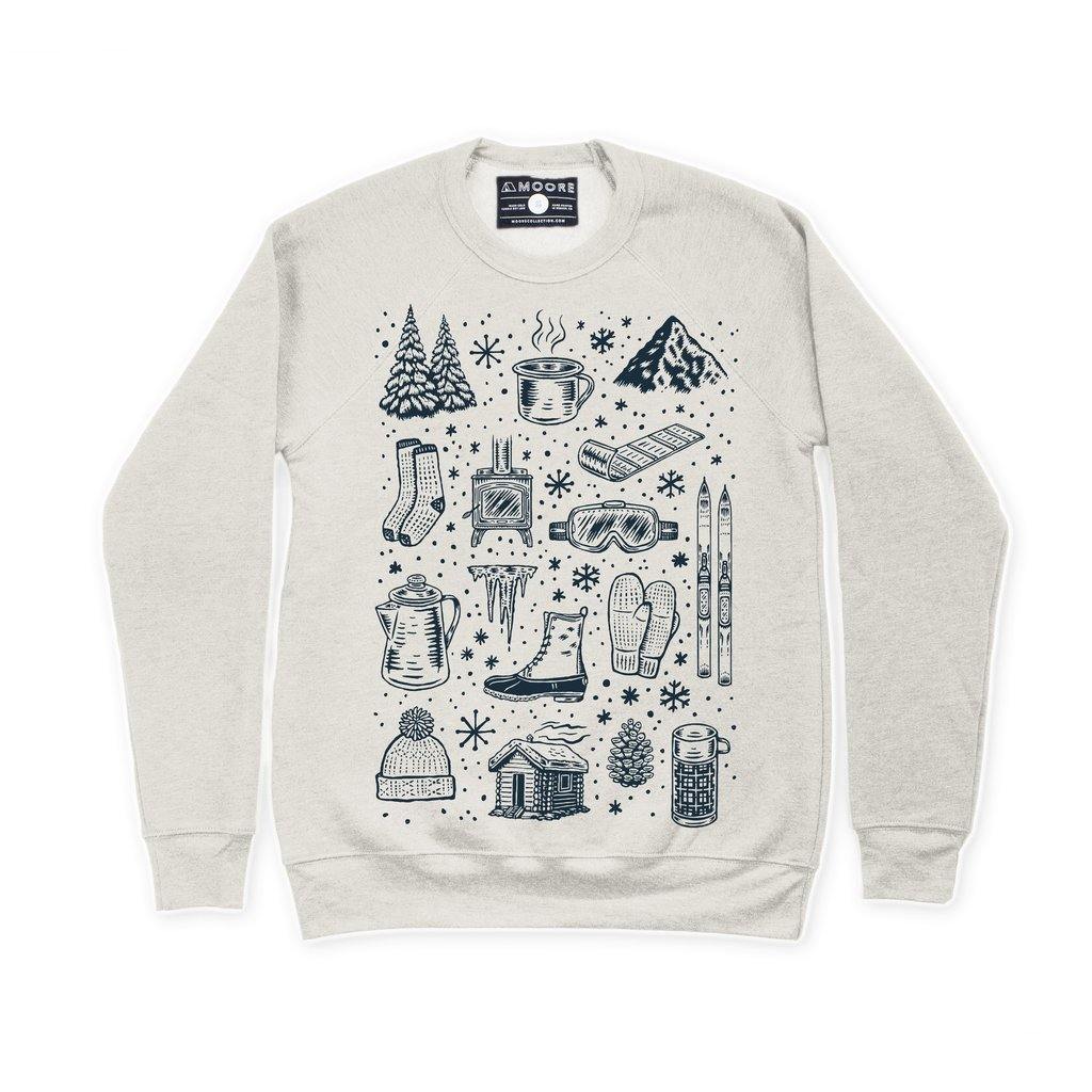 Oatmeal colored crew neck sweatshirt featuring winter activities