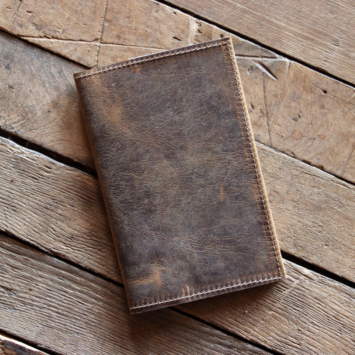 Exterior of leather notebook cover. Passport cover