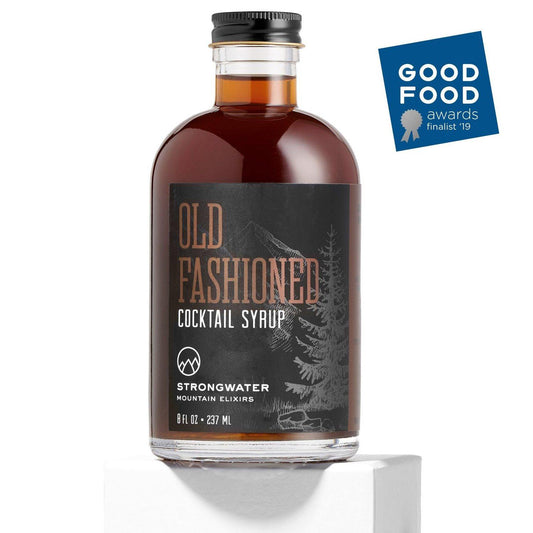 Old fashioned cocktail syrup mix in glass bottle