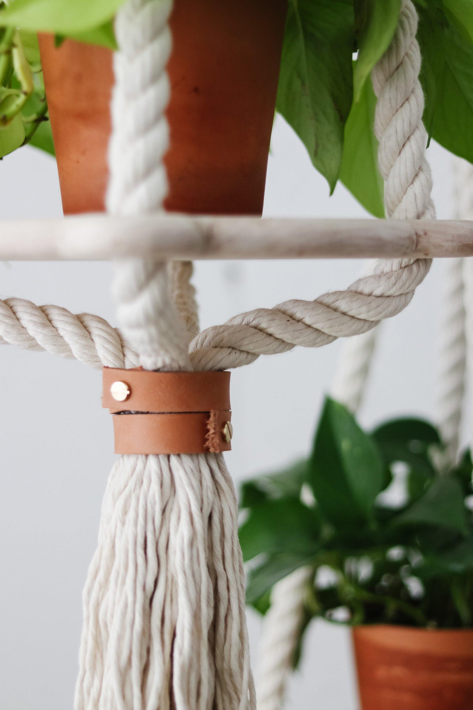 hanging planters with wood and leather