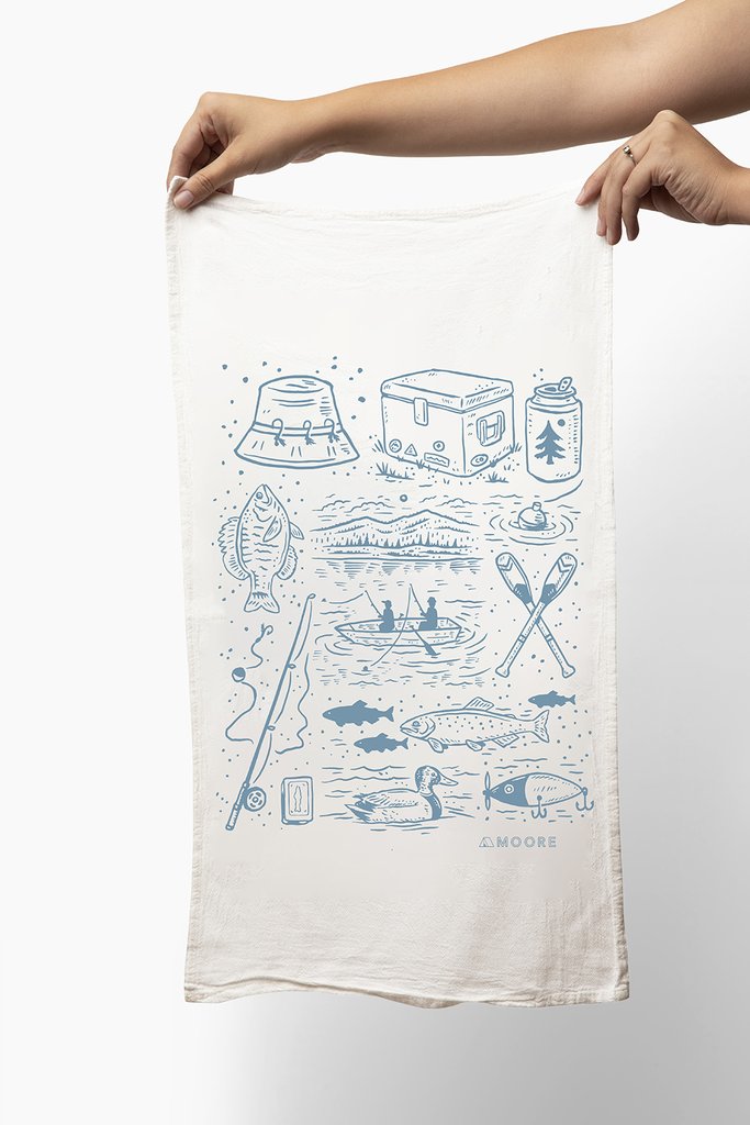 Lake Life printed tea towel with blue lake-themed illustrations