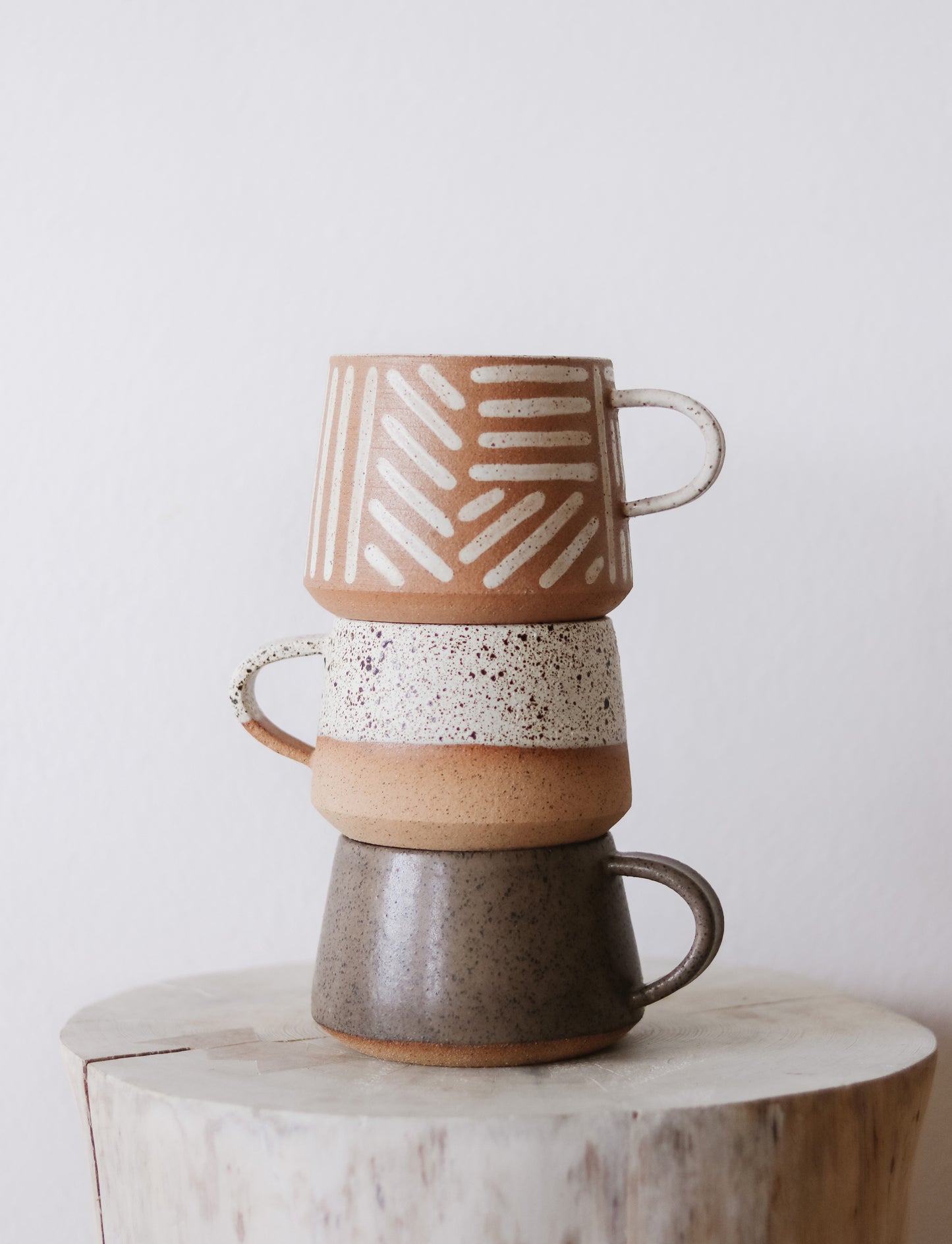 stack of stoneware mugs